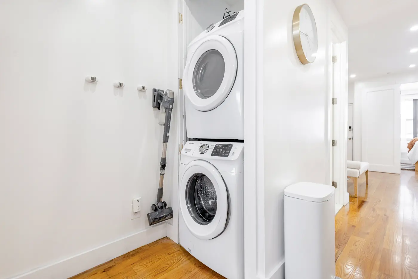 In-unit stacked washer and dryer